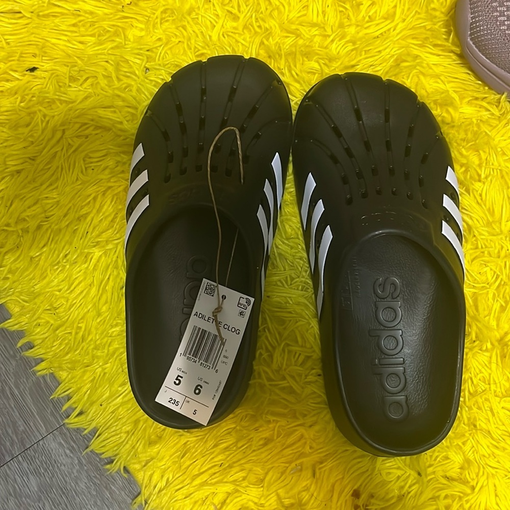 Brand new Adidas slippers black with white strips